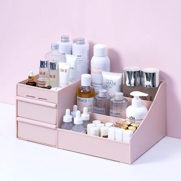 a pink box filled with lots of clutter 