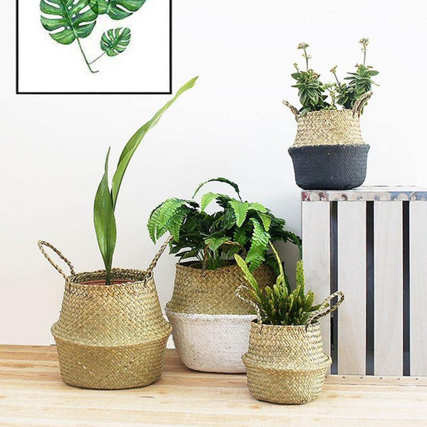 a couple of vases that are on a table 