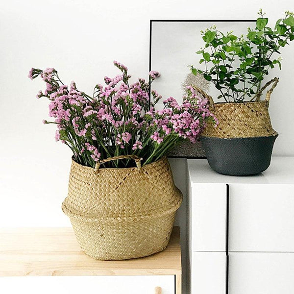 a vase of flowers sitting on a table 
