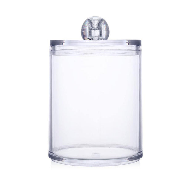a glass jar filled with water on a table 